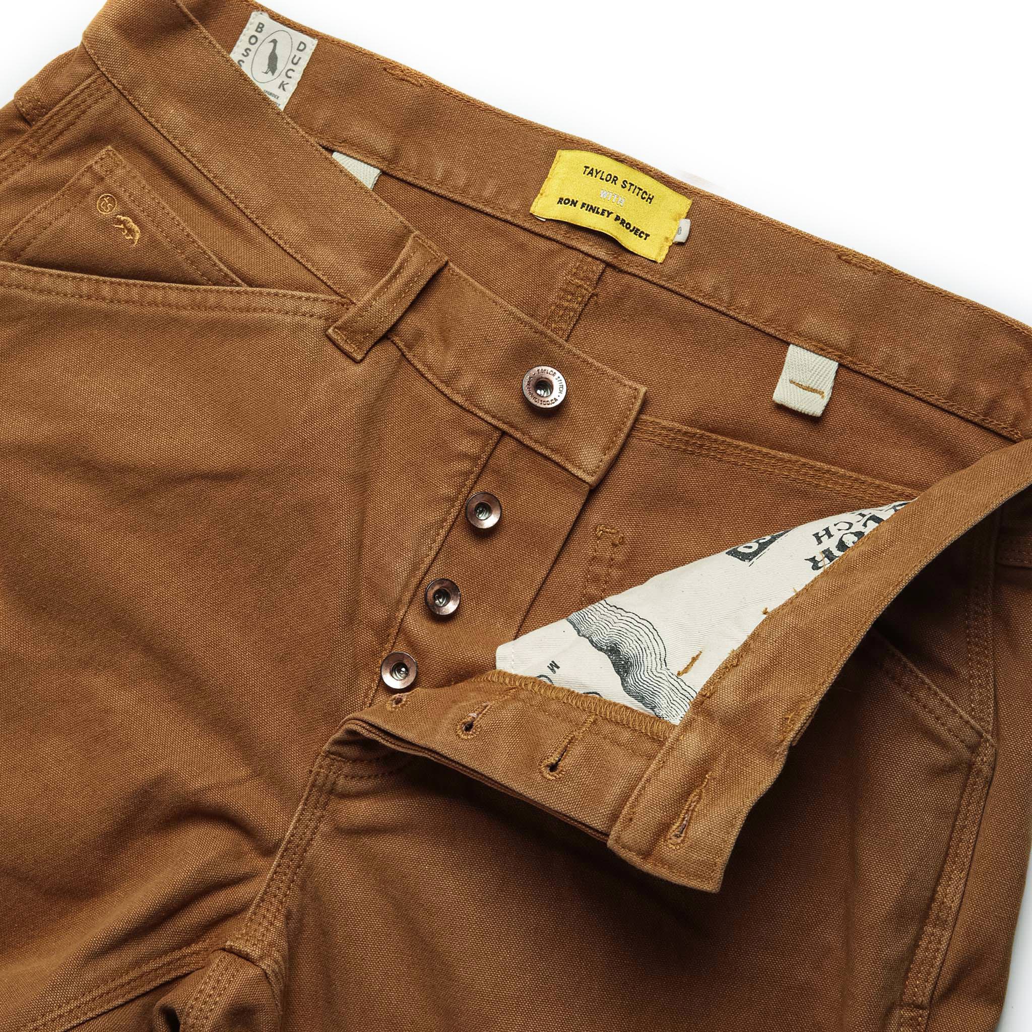 material shot of open zipper fly of The Carpenter Pant in Cedar Boss Duck, Bottoms by Taylor Stitch