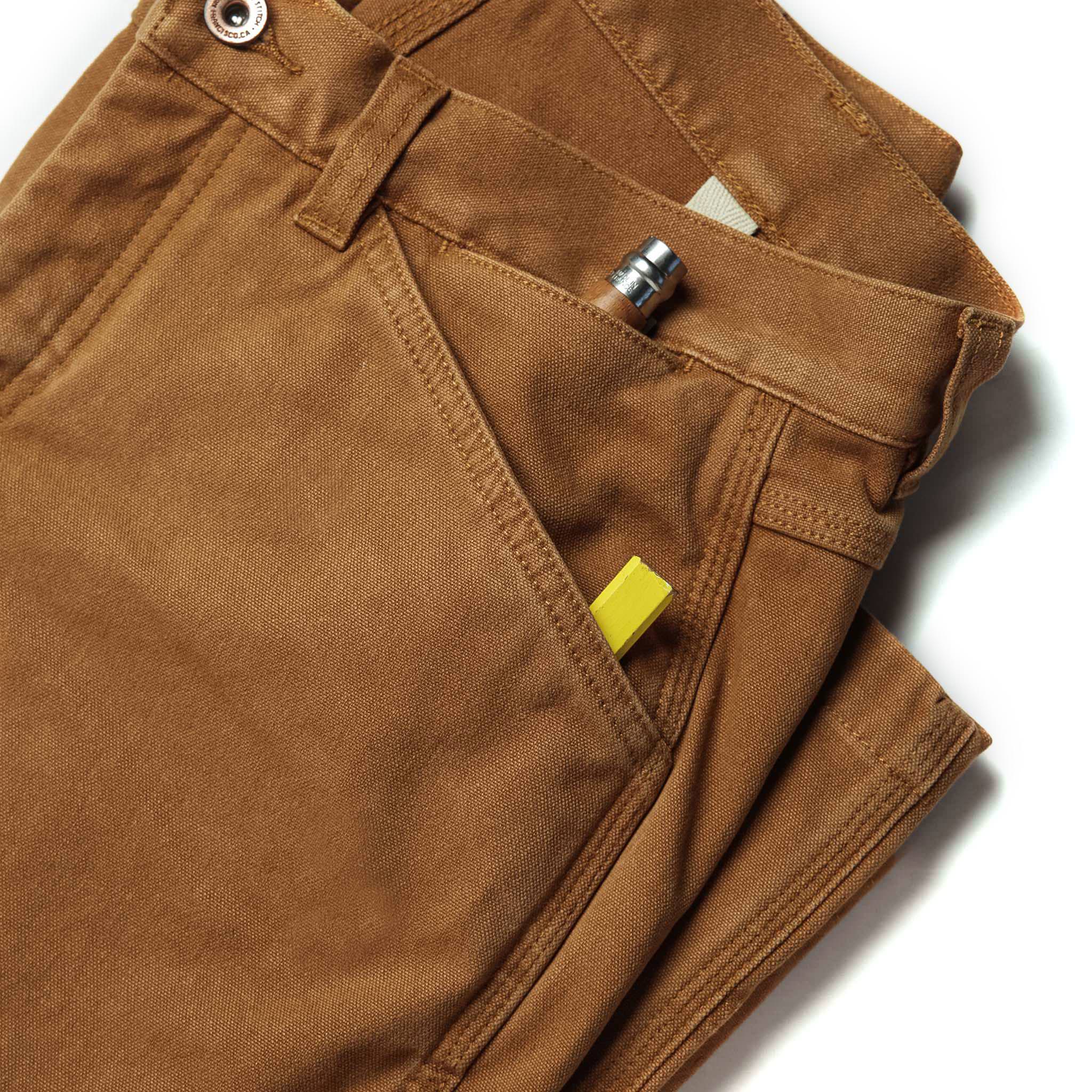 material shot of front pocket of The Carpenter Pant in Cedar Boss Duck, Bottoms by Taylor Stitch