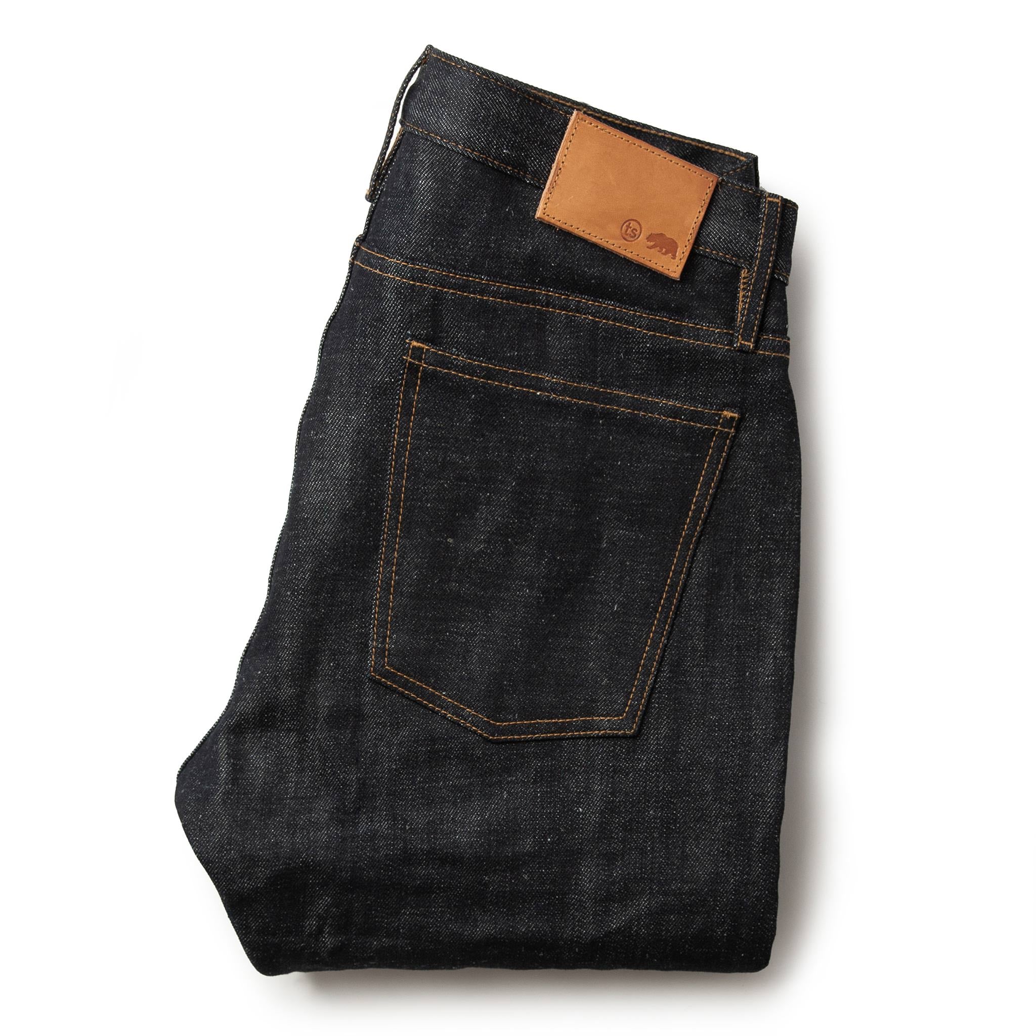 flatlay of jeans, Bottoms by Taylor Stitch