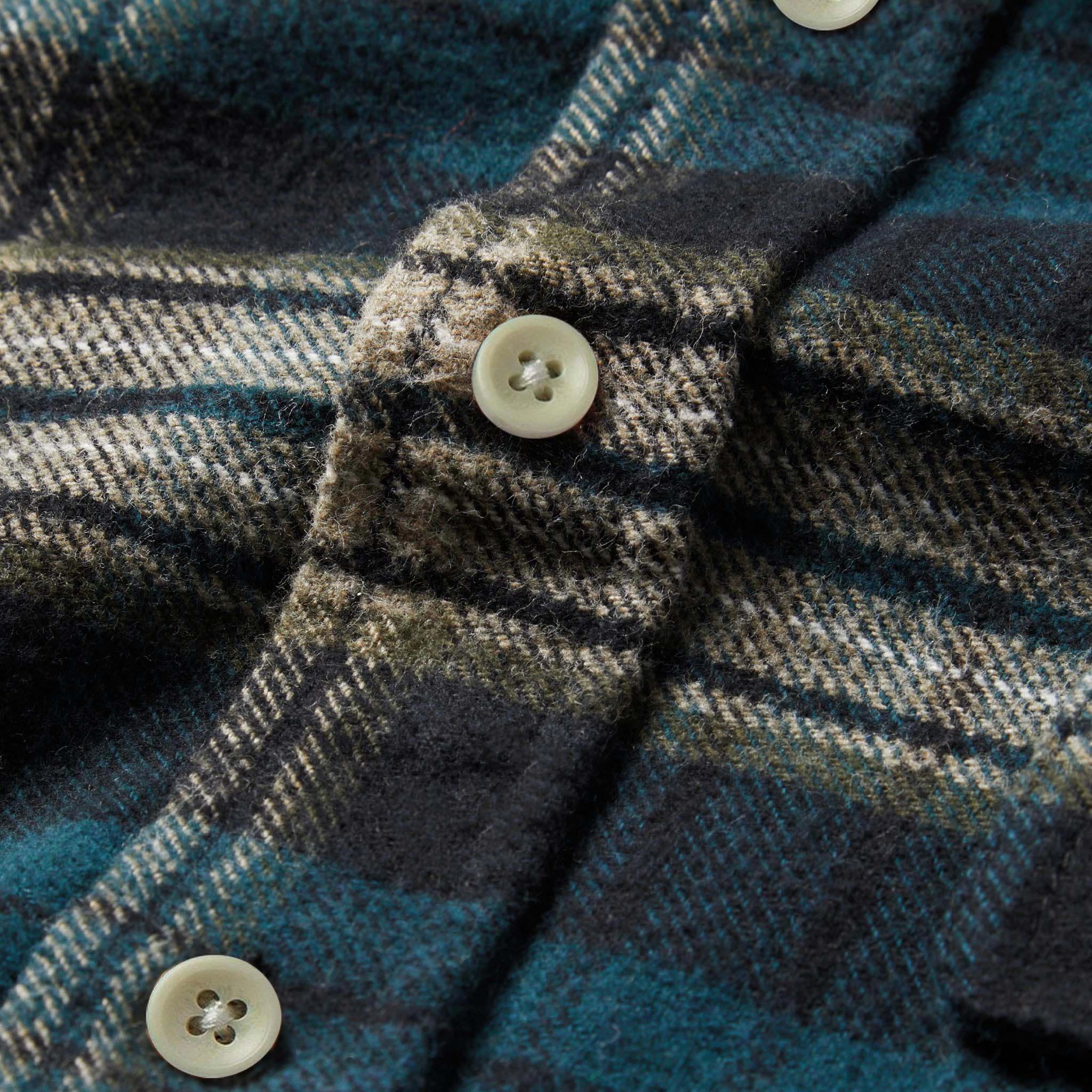 material shot of The Ledge Shirt in Deep Sea Plaid showing front placket and buttons, Wovens by Taylor Stitch