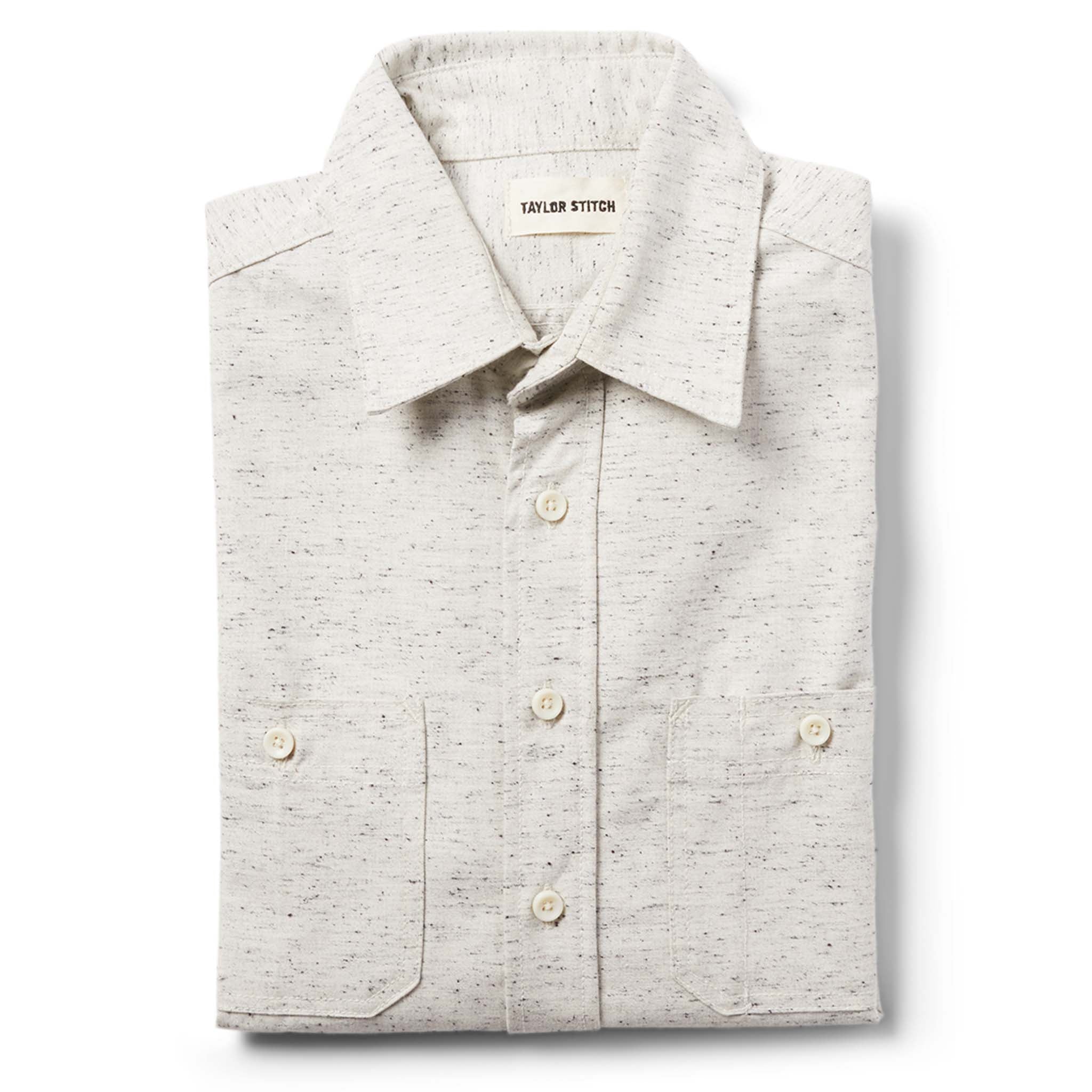 flatlay of The Utility Shirt in Japanese Kuroki Natural Nep folded, Wovens by Taylor Stitch