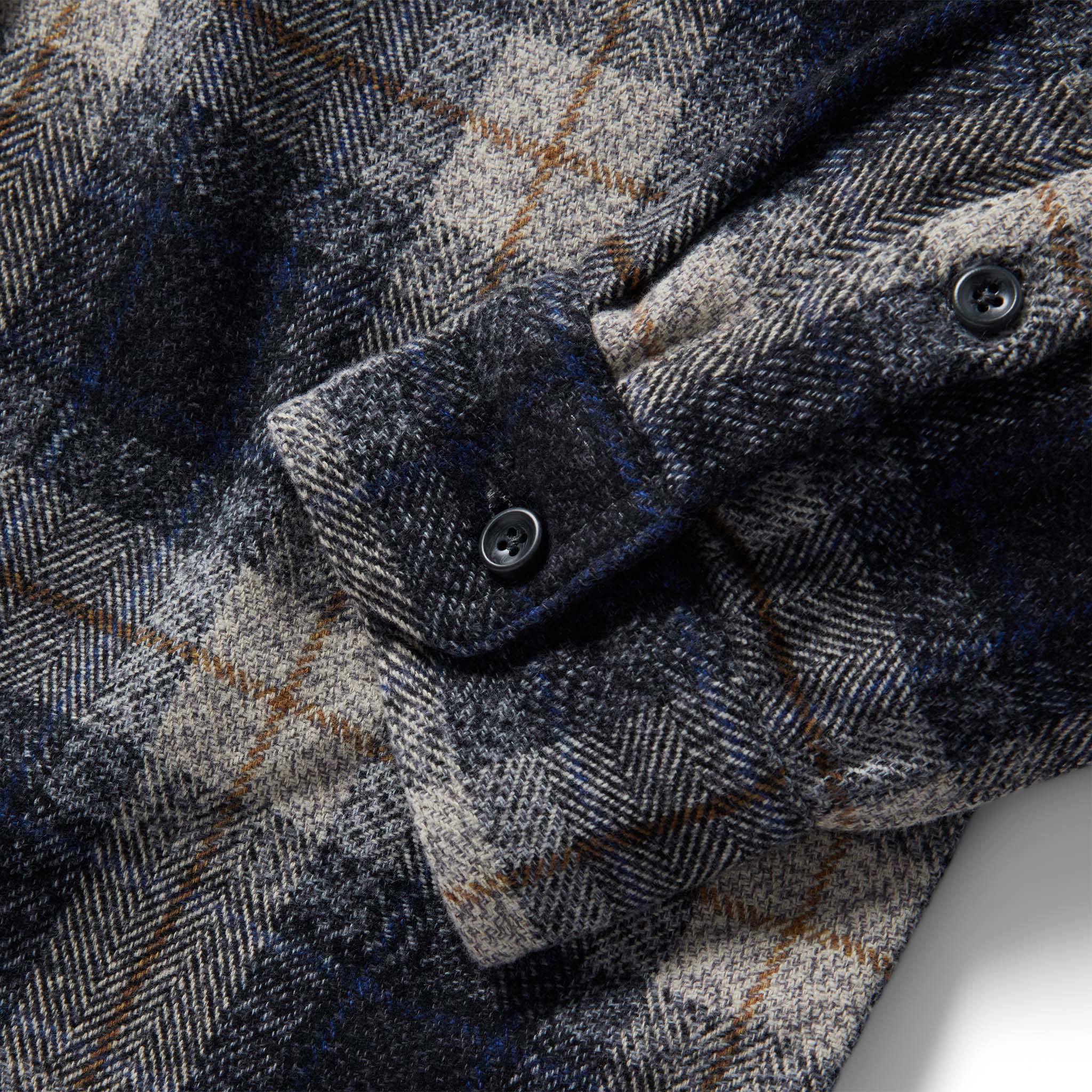 material shot of the cuffs on The Utility Shirt in Navy Jaspe Herringbone Plaid, Wovens by Taylor Stitch