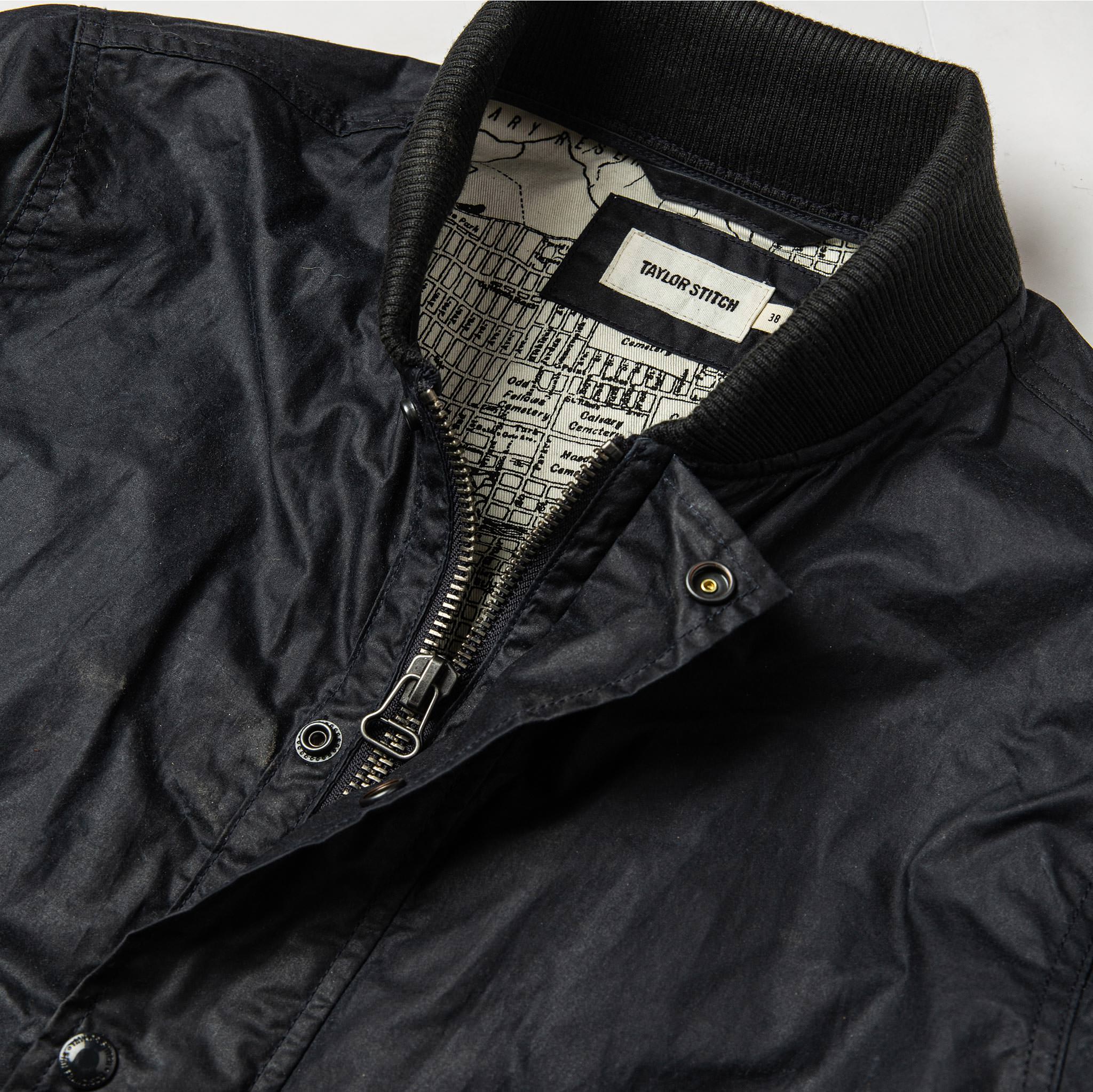 material shot of open collar and front placket, Outerwear by Taylor Stitch