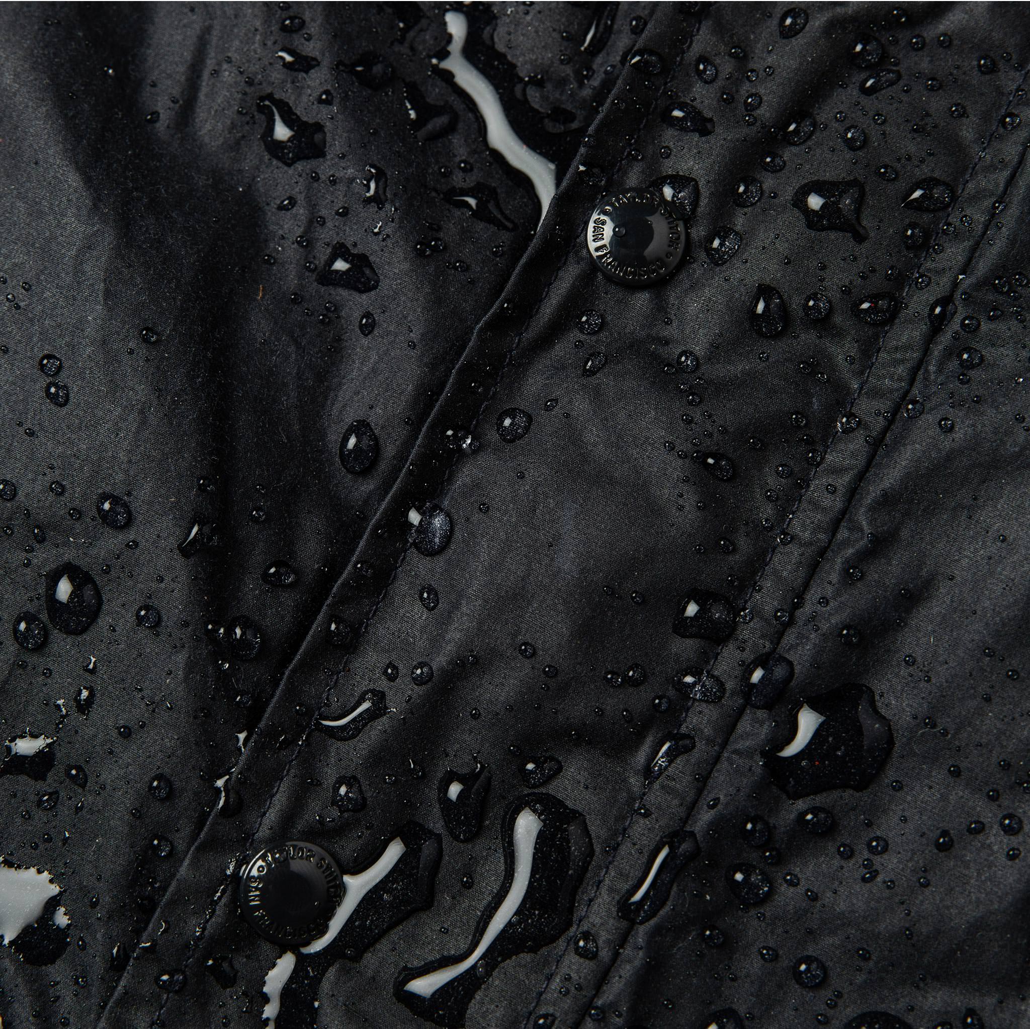 material shot of water on front placket showing weatherproofing of wax treatment, Outerwear by Taylor Stitch