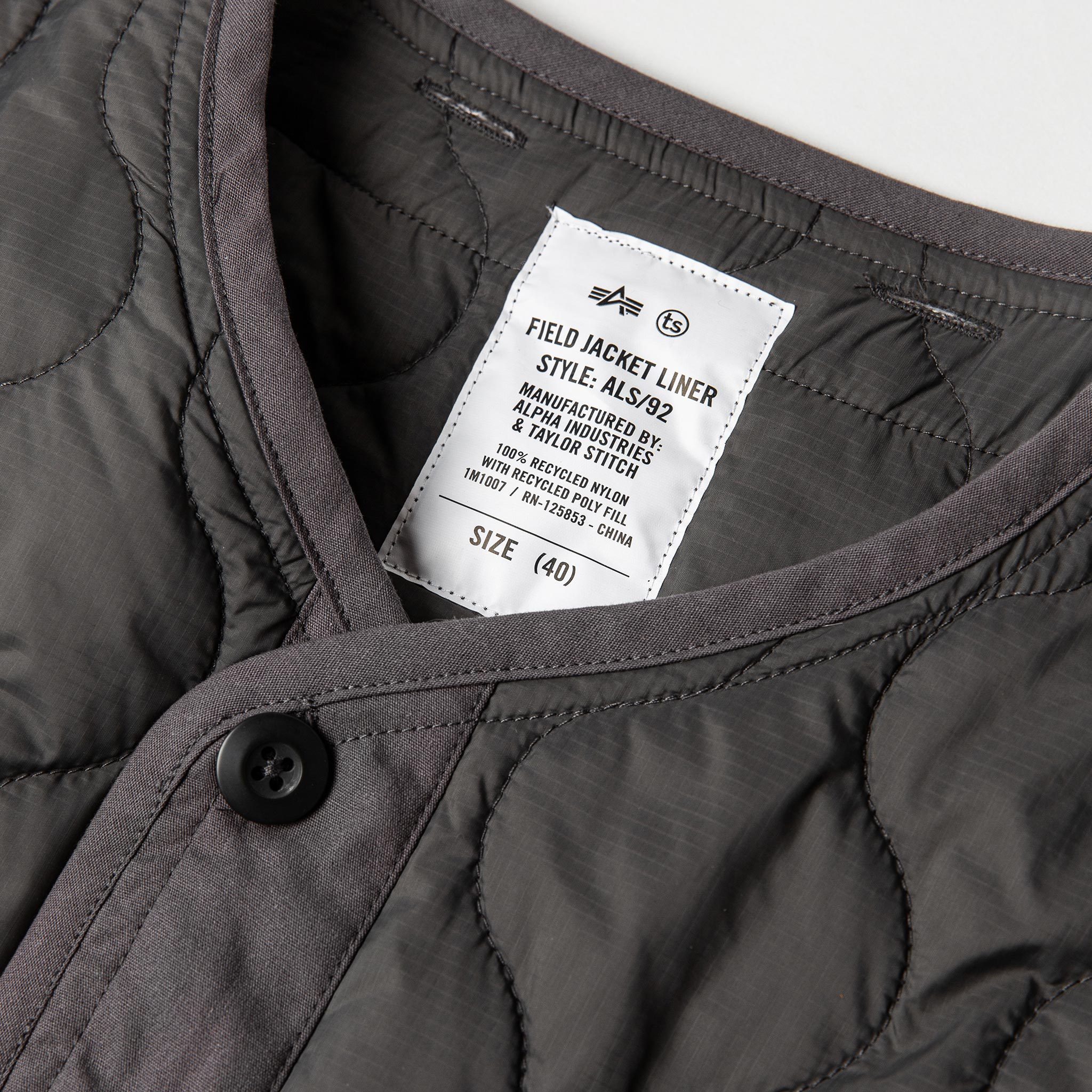 material shot of interior tag, Outerwear by Taylor Stitch